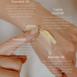 Spreading Reign Moisturiser onto hand. Text surrounding indicates benefits of the product.