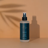 Skincare Reign Cooling Mist and face toner on a warm background
