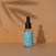 Skincare Reign Hyaluronic serum bottle with dropper on a warm background
